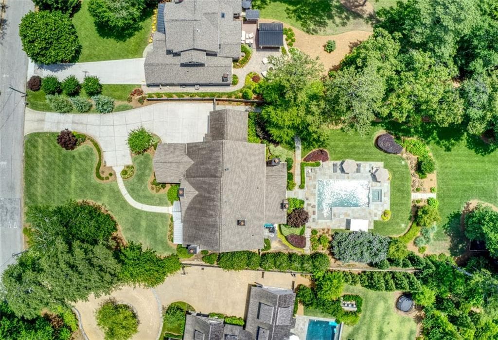 6 bedroom, 8 bathroom, 9,000 sq ft single family residence sold at 57 Interlochen Drive, Atlanta, GA 30342