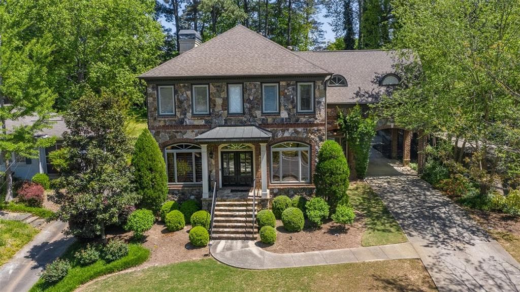 5 bedroom, 5 bathroom, 5,599 sq ft single family residence sold at 1635 Wildwood Road, Atlanta, GA 30306