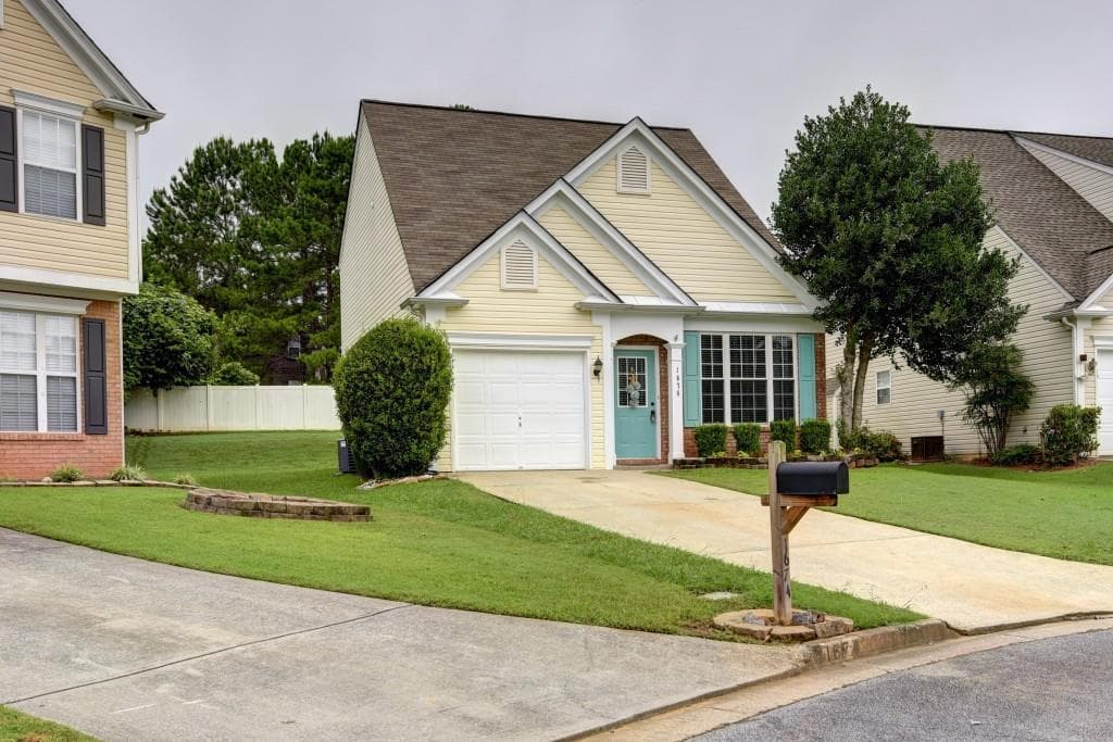 3 bedroom, 3 bathroom, 1,555 sq ft single family residence sold at 1676 Woodsford Road, Kennesaw, GA 30152