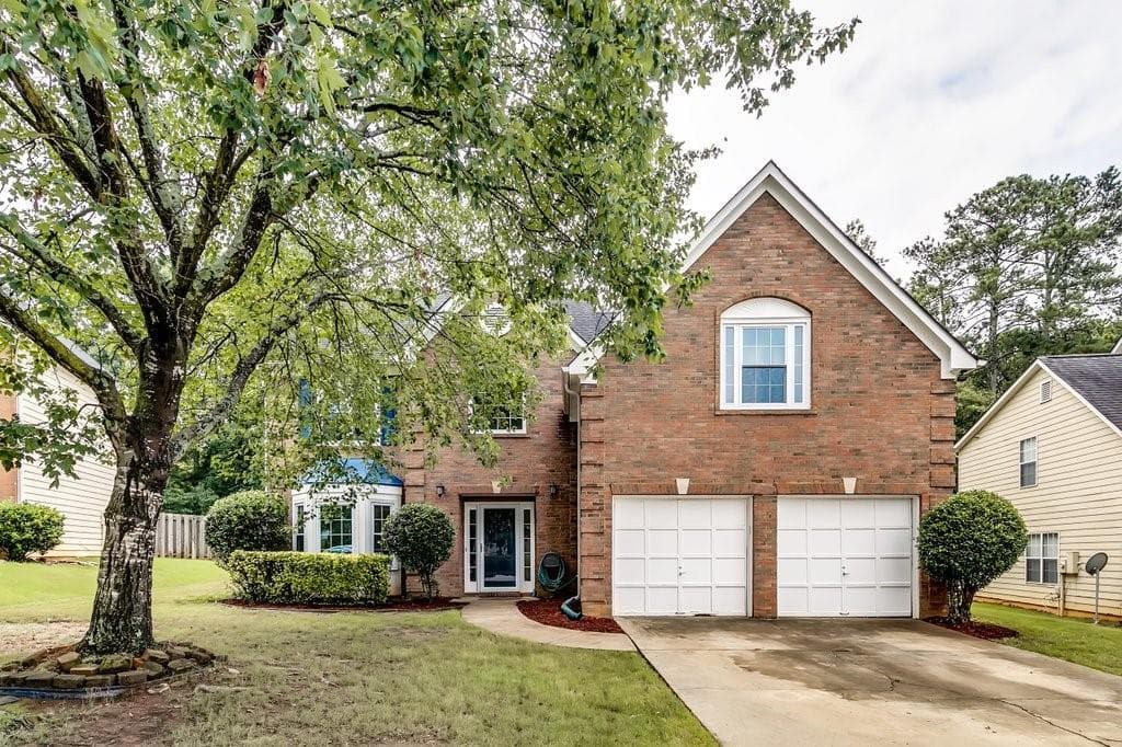 4 bedroom, 3 bathroom, 2,234 sq ft single family residence sold at 1105 Laurel Cove Drive, Snellville, GA 30078