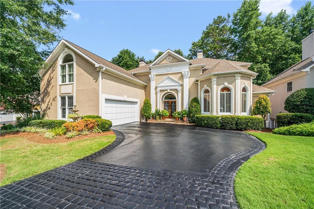 4 bedroom, 5 bathroom, 3,921 sq ft single family residence sold at 785 Olde Clubs Drive, Alpharetta, GA 30022