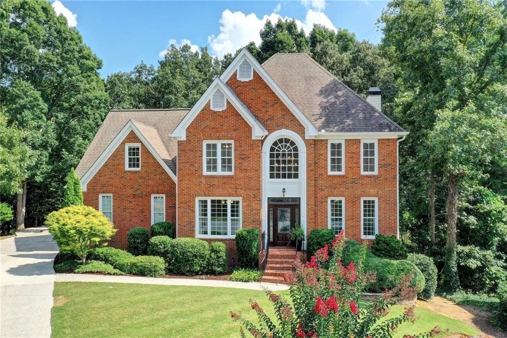 5 bedroom, 4 bathroom, 4,500 sq ft single family residence sold at 240 Red Hawk Trail, Johns Creek, GA 30022