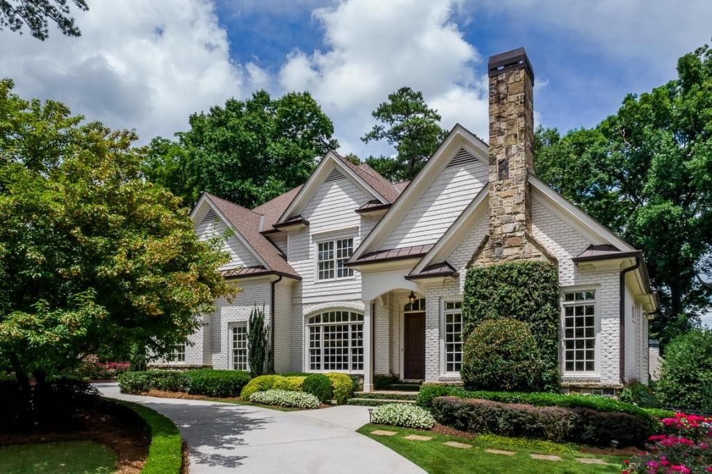 5 bedroom, 5 bathroom, 6,309 sq ft single family residence sold at 310 Old Ivy Road, Atlanta, GA 30342