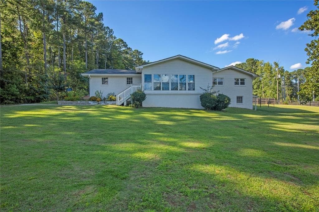 3 bedroom, 3 bathroom, 2,700 sq ft single family residence sold at 15590 Thompson Road, Alpharetta, GA 30004