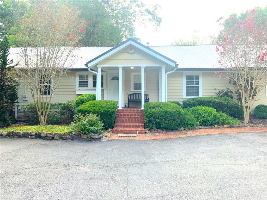 4 bedroom, 3 bathroom, 3,726 sq ft single family residence sold at 2071 Allgood Road, Marietta, GA 30062