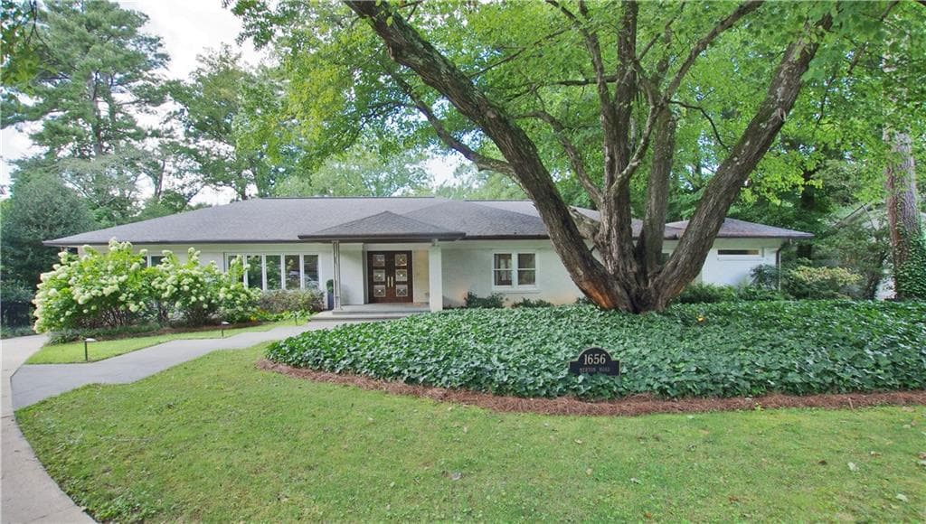 5 bedroom, 5 bathroom, 5,757 sq ft single family residence sold at 1656 Merton Road, Atlanta, GA 30306