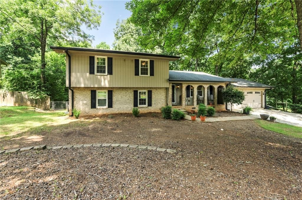 4 bedroom, 3 bathroom, 2,372 sq ft single family residence sold at 6879 Lockridge Drive, Atlanta, GA 30360