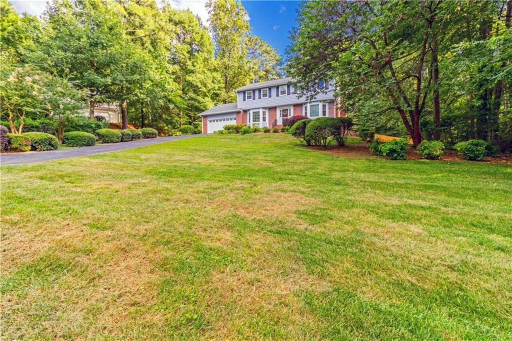 5 bedroom, 3 bathroom, 2,822 sq ft single family residence sold at 115 Whisperwood Court, Roswell, GA 30075
