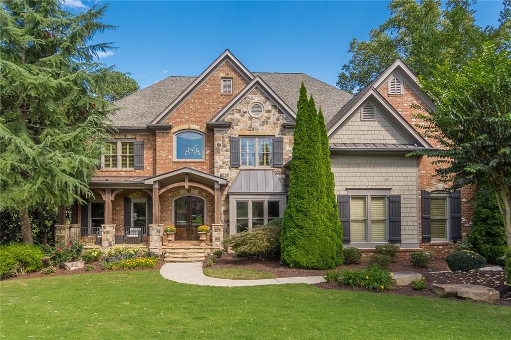6 bedroom, 7 bathroom, 7,561 sq ft single family residence sold at 2435 Concord Creek Trail, Cumming, GA 30041