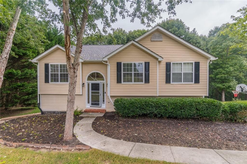 4 bedroom, 3 bathroom single family residence sold at 7229 Tascosa Drive, Flowery Branch, GA 30542