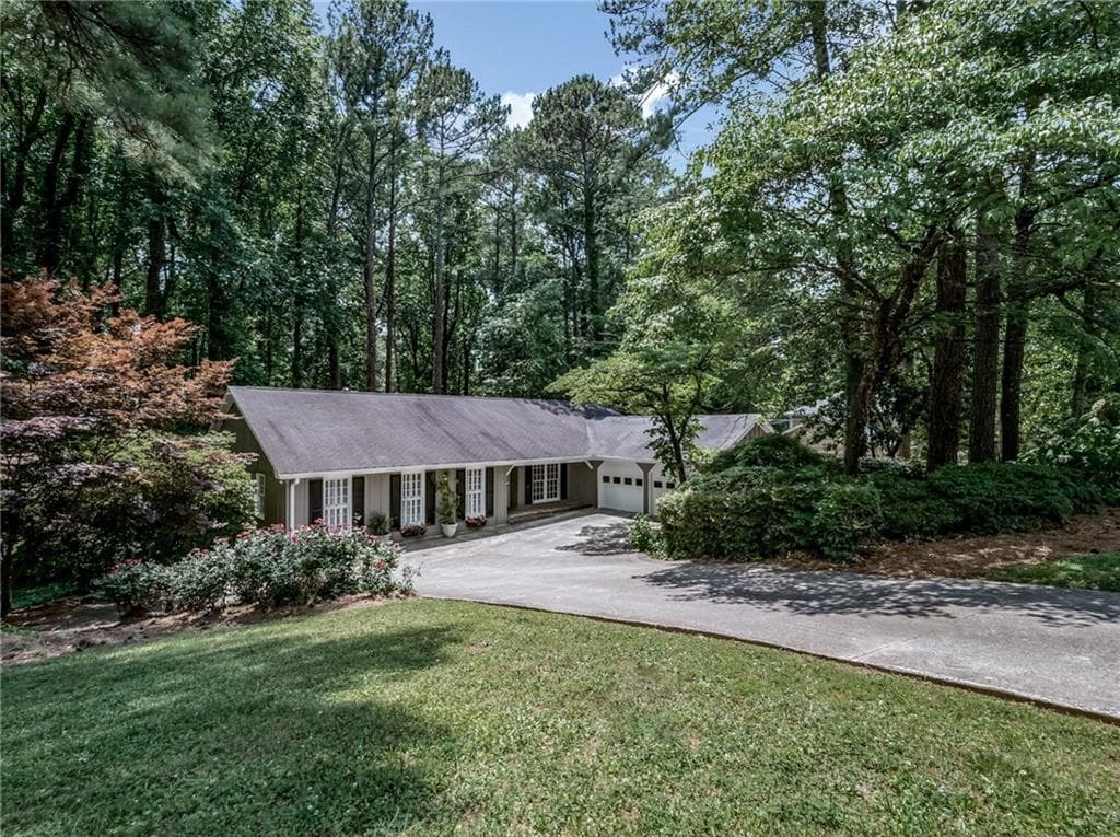 5 bedroom, 2 bathroom, 4,026 sq ft single family residence sold at 1450 Brawley Circle, Brookhaven, GA 30319