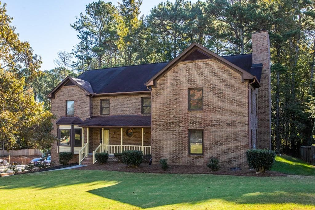 6 bedroom, 5 bathroom, 4,602 sq ft single family residence sold at 5000 Bainbridge Court, Lilburn, GA 30047