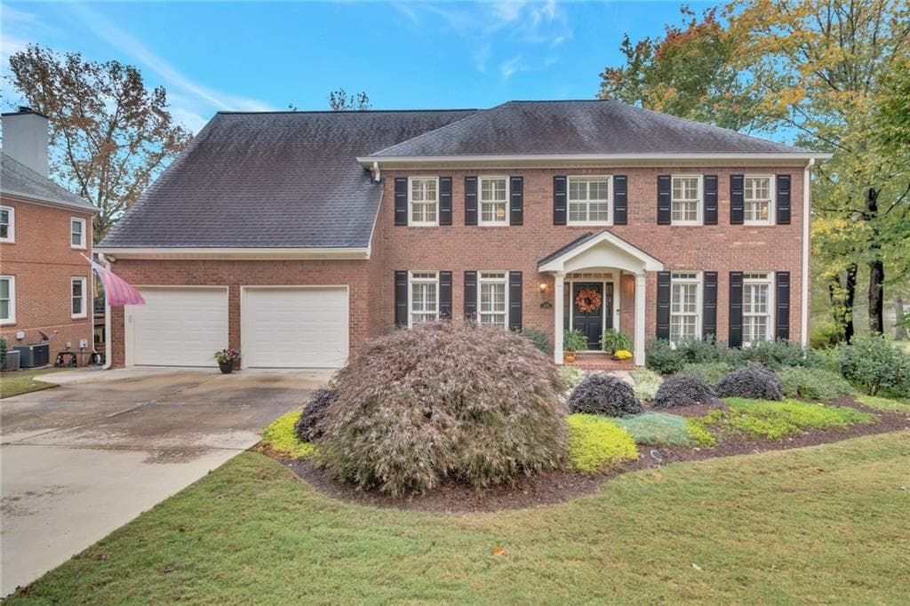 4 bedroom, 5 bathroom, 3,206 sq ft single family residence sold at 4008 Penhurst Drive, Marietta, GA 30062