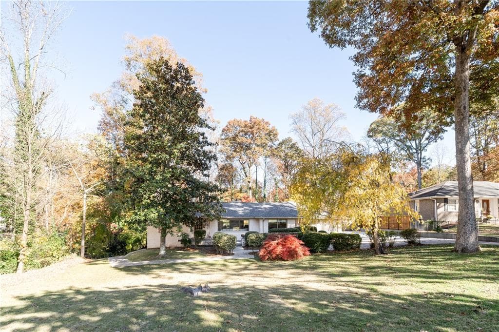 4 bedroom, 3 bathroom, 4,392 sq ft single family residence sold at 2519 Clairmont Road, Atlanta, GA 30329