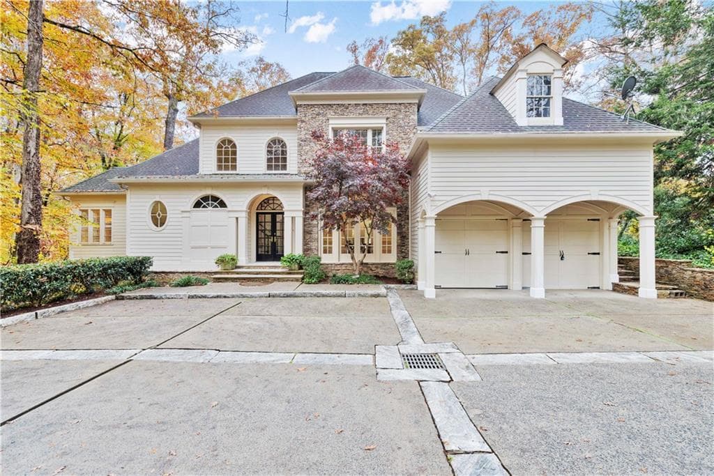 4 bedroom, 6 bathroom, 6,264 sq ft single family residence sold at 1296 W Wesley Road, Atlanta, GA 30327