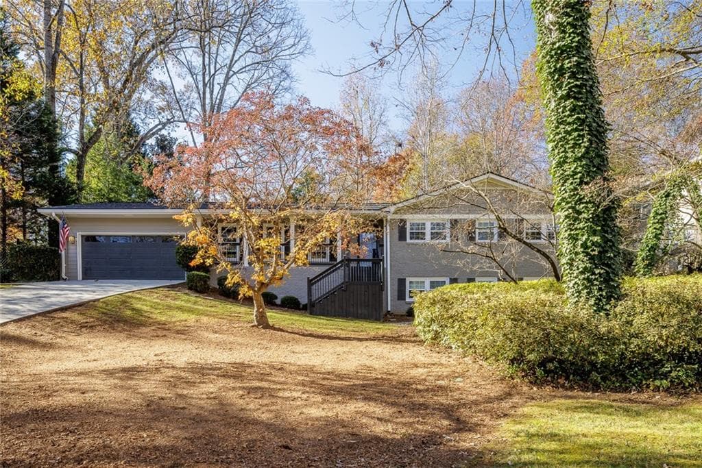 4 bedroom, 4 bathroom, 3,254 sq ft single family residence sold at 2714 Wood Hollow Drive, Dunwoody, GA 30360