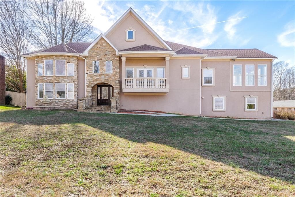 4 bedroom, 4 bathroom, 4,811 sq ft single family residence sold at 1977 VILLAGE NORTH Road, Atlanta, GA 30338