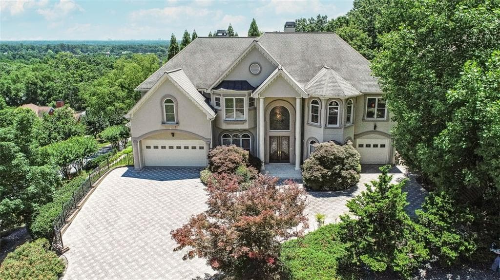 7 bedroom, 8 bathroom, 8,524 sq ft single family residence sold at 811 Pinnacle Place, Marietta, GA 30062