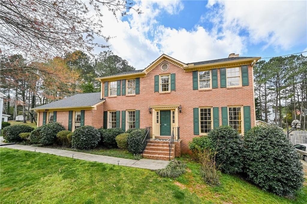 4 bedroom, 3 bathroom, 2,870 sq ft single family residence sold at 1035 Lassiter Drive, Stone Mountain, GA 30087