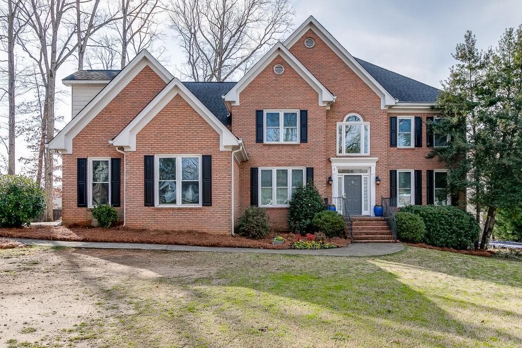 5 bedroom, 3 bathroom, 4,087 sq ft single family residence sold at 1970 Holland Park Drive, Buford, GA 30519