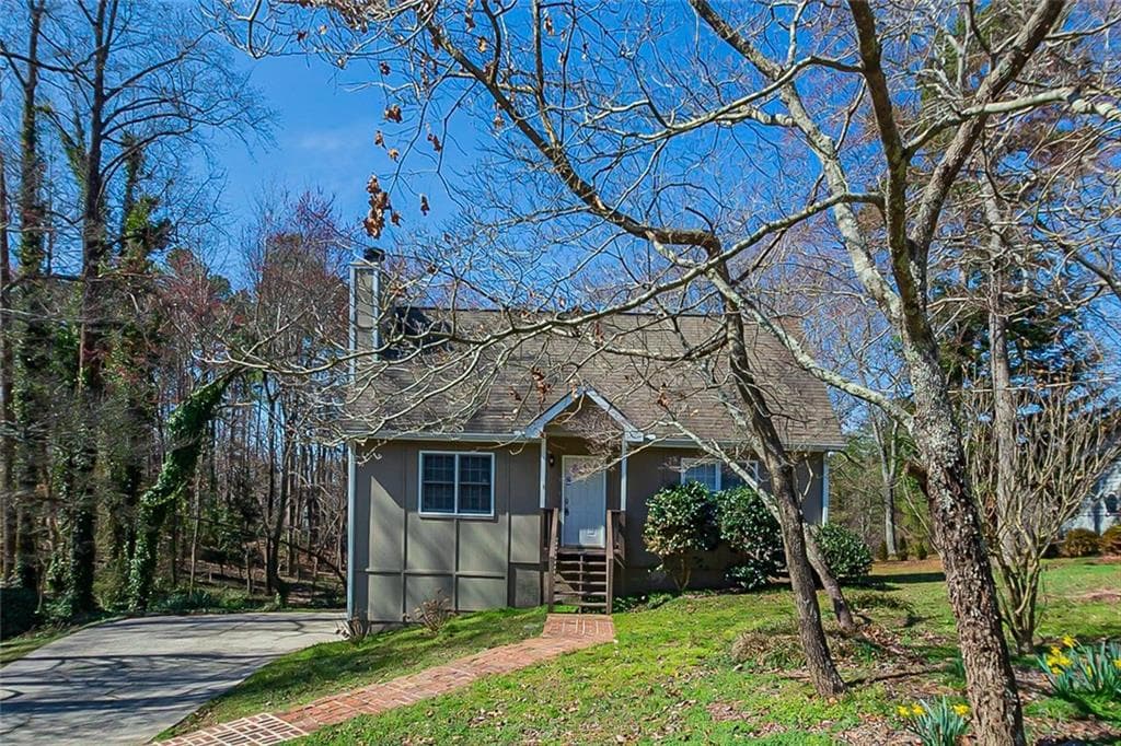 3 bedroom, 2 bathroom, 1,296 sq ft single family residence sold at 5115 Forest Hills Drive, Cumming, GA 30041