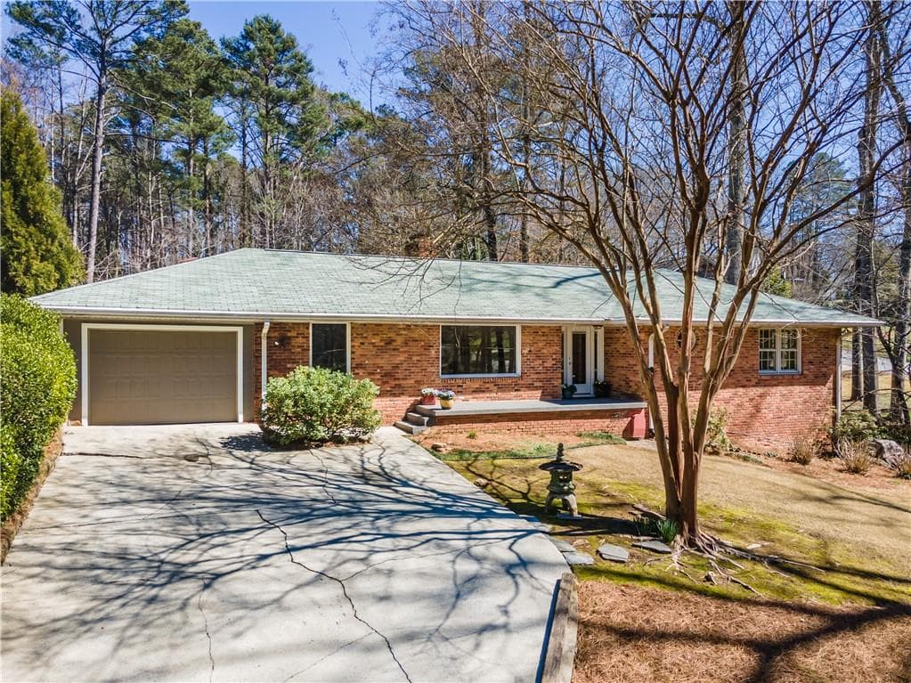 4 bedroom, 3 bathroom, 3,929 sq ft single family residence sold at 1248 Wild Creek Trail, Atlanta, GA 30324