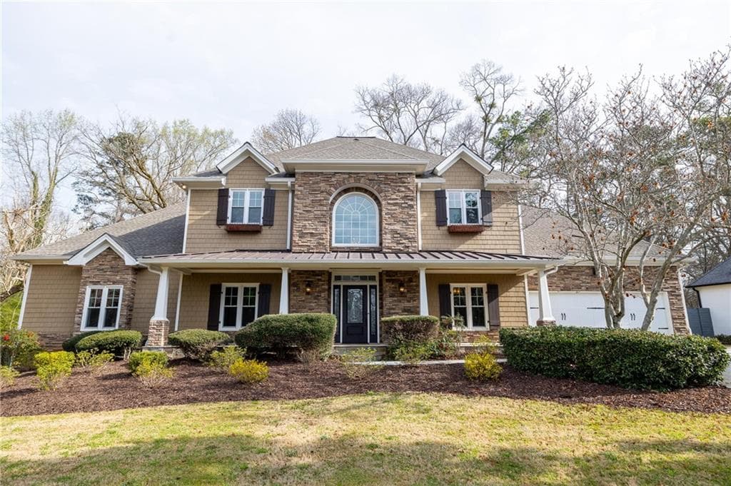 5 bedroom, 5 bathroom, 6,072 sq ft single family residence sold at 860 Agan Place, Atlanta, GA 30342