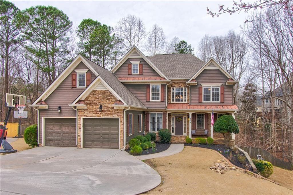 7 bedroom, 5 bathroom, 4,881 sq ft single family residence sold at 606 Blue Water Way, Canton, GA 30114
