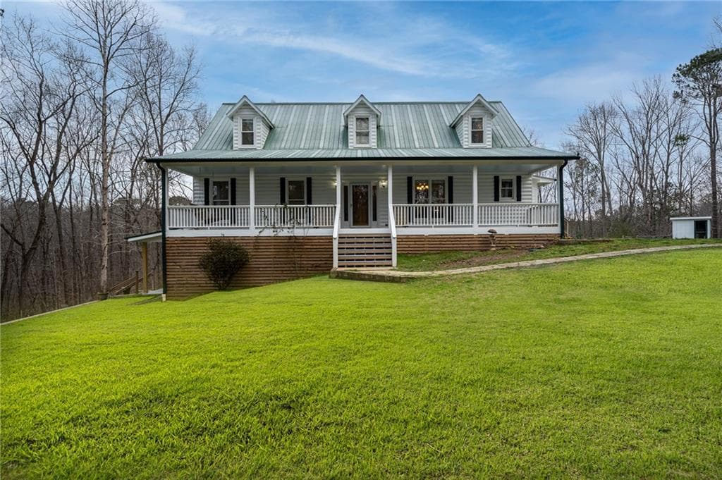 5 bedroom, 4 bathroom, 3,916 sq ft single family residence sold at 4055 Knox Bridge Highway, Canton, GA 30114
