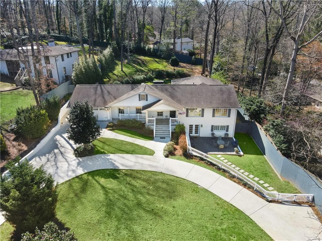 5 bedroom, 4 bathroom, 4,725 sq ft single family residence sold at 1475 Harts Mill Road, Brookhaven, GA 30319
