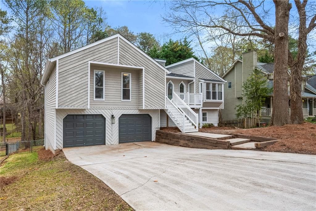 4 bedroom, 3 bathroom, 3,048 sq ft single family residence sold at 410 Saint Simons Cove, Lawrenceville, GA 30044