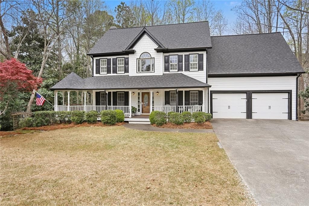 5 bedroom, 4 bathroom, 3,643 sq ft single family residence sold at 910 Laurel Crest Drive, Woodstock, GA 30189