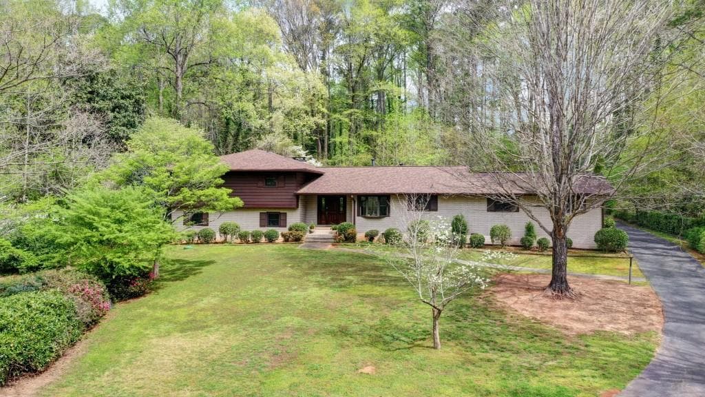 5 bedroom, 4 bathroom, 4,201 sq ft single family residence sold at 5474 Smoke Rise Drive, Stone Mountain, GA 30087