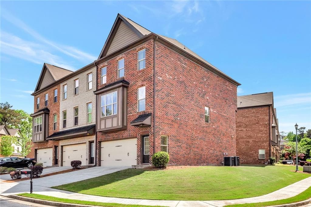 4 bedroom, 4 bathroom, 2,458 sq ft townhouse sold at 1202 Laurel Valley Court, Buford, GA 30519