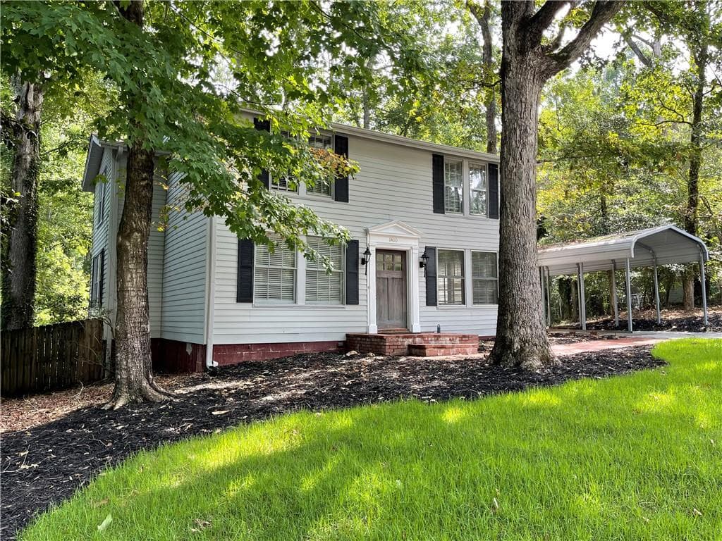 4 bedroom, 3 bathroom, 2,616 sq ft single family residence sold at 1400 Woodland Circle, Gainesville, GA 30501