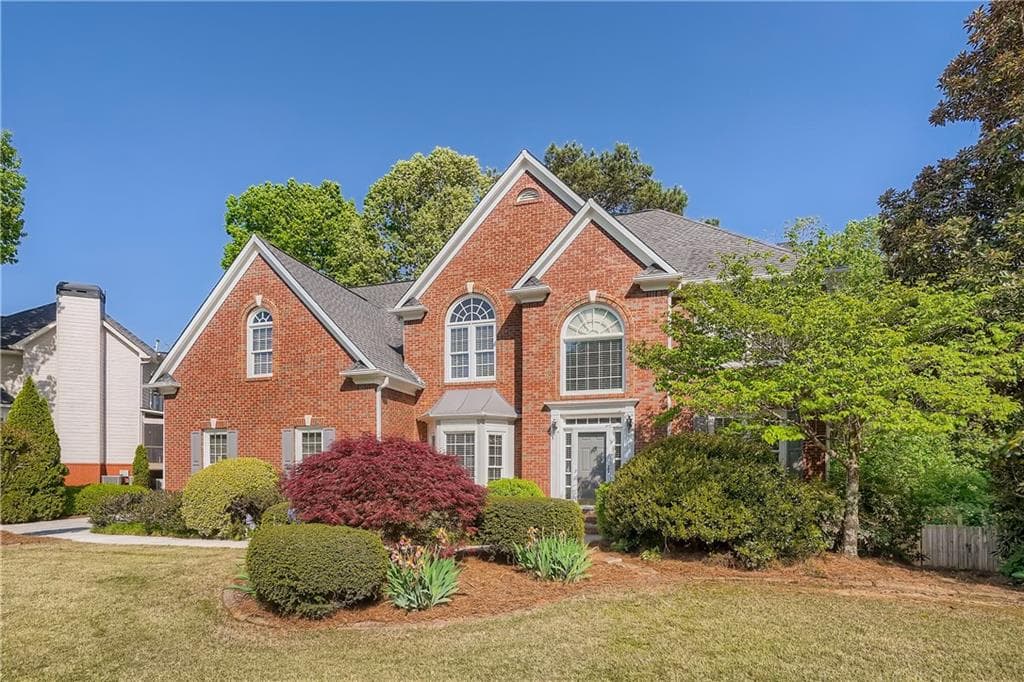4 bedroom, 5 bathroom, 4,844 sq ft single family residence sold at 5010 Winding Hills Lane, Woodstock, GA 30189