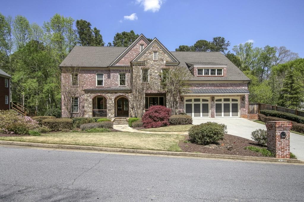 6 bedroom, 5 bathroom, 8,692 sq ft single family residence sold at 3228 Arborwoods Drive, Alpharetta, GA 30022