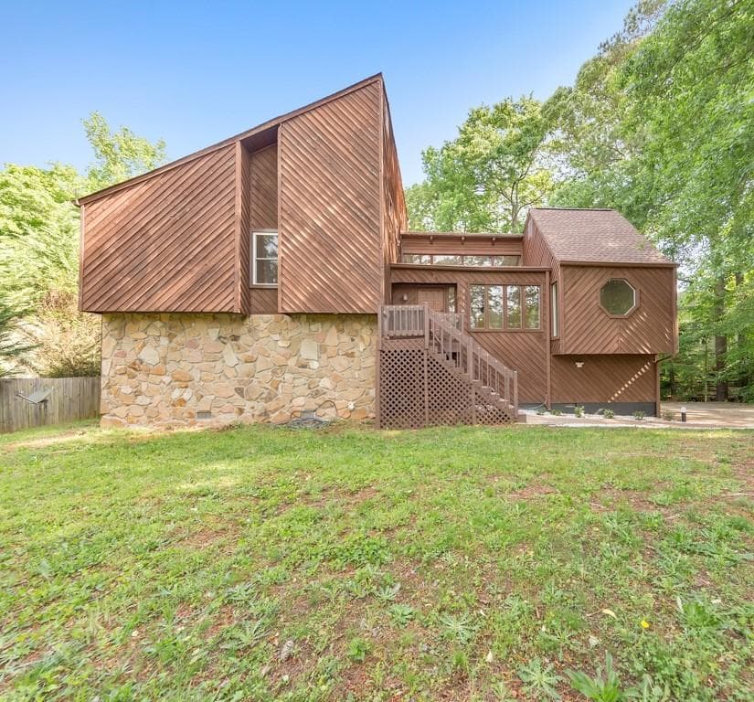 5 bedroom, 3 bathroom, 2,458 sq ft single family residence sold at 2919 Post Oak Tritt Road, Marietta, GA 30062
