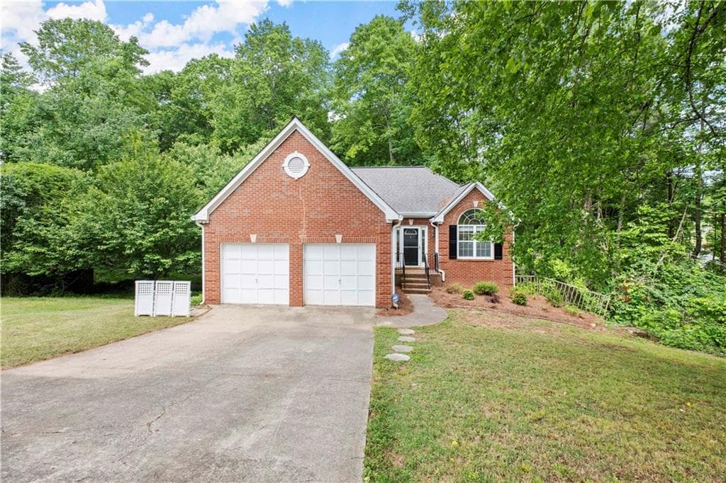 4 bedroom, 3 bathroom, 2,068 sq ft single family residence sold at 205 Pebble Creek Court, Woodstock, GA 30189