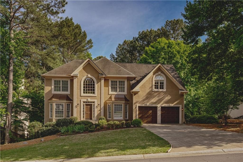 5 bedroom, 4 bathroom, 4,518 sq ft single family residence sold at 1008 Fairway Valley Drive, Woodstock, GA 30189