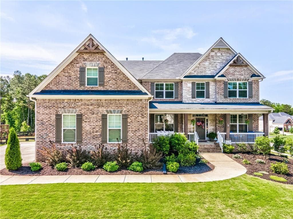 5 bedroom, 5 bathroom, 4,948 sq ft single family residence sold at 6695 Canyon Cove, Cumming, GA 30028