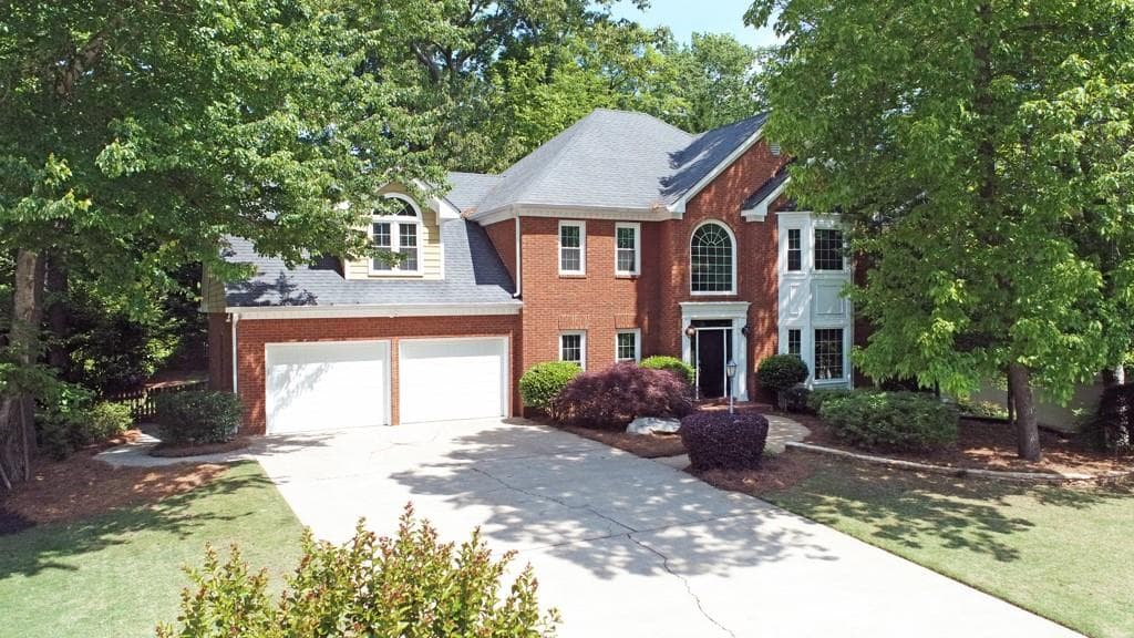 6 bedroom, 4 bathroom, 4,168 sq ft single family residence sold at 5490 Grove Point Road, Johns Creek, GA 30022