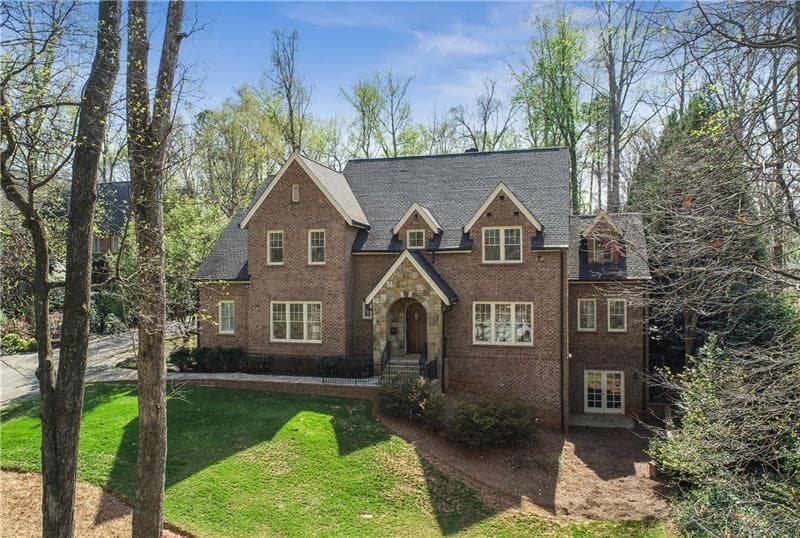6 bedroom, 8 bathroom, 7,148 sq ft single family residence sold at 2071 E Lake Road, Atlanta, GA 30307