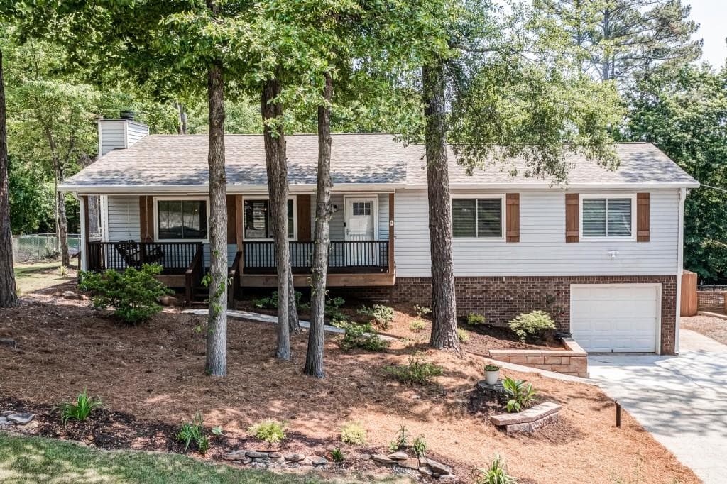 4 bedroom, 3 bathroom, 2,496 sq ft single family residence sold at 573 Rivercrest Drive, Woodstock, GA 30188