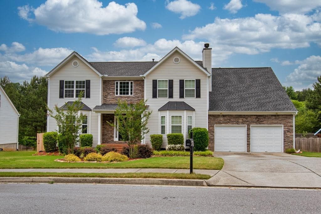 4 bedroom, 4 bathroom, 3,172 sq ft single family residence sold at 5472 Skylar Creek Lane, Buford, GA 30518