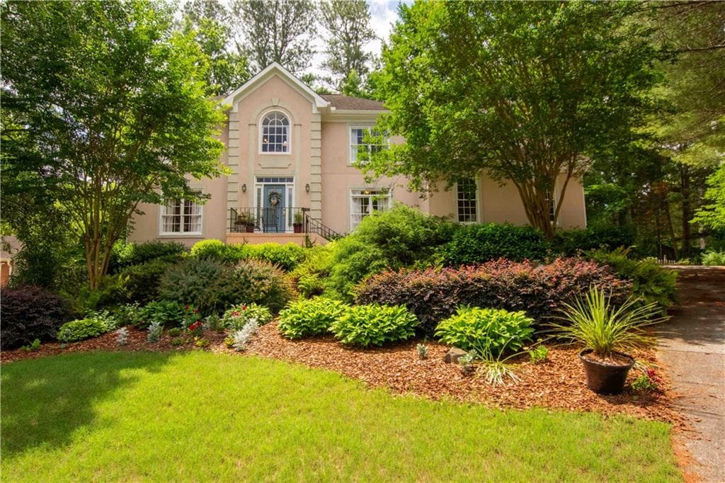 4 bedroom, 3 bathroom, 3,406 sq ft single family residence sold at 4060 Colonial Trail, Lilburn, GA 30047
