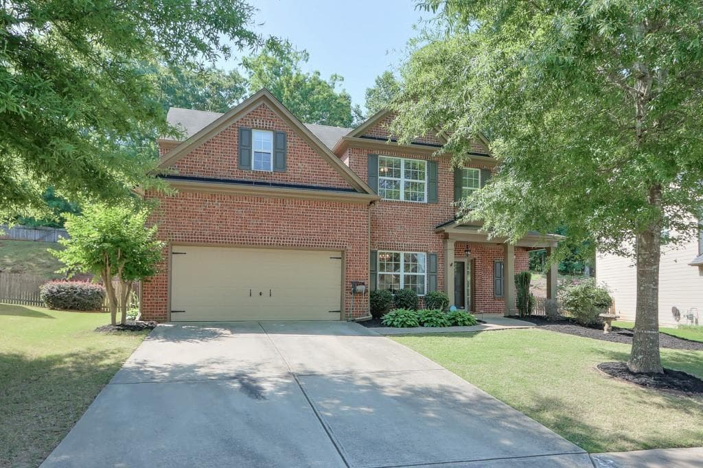 4 bedroom, 3 bathroom, 2,027 sq ft single family residence sold at 6635 Grove Meadows Lane, Cumming, GA 30028