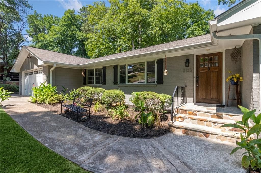 4 bedroom, 3 bathroom, 3,865 sq ft single family residence sold at 2133 Briarwillow Drive, Atlanta, GA 30345