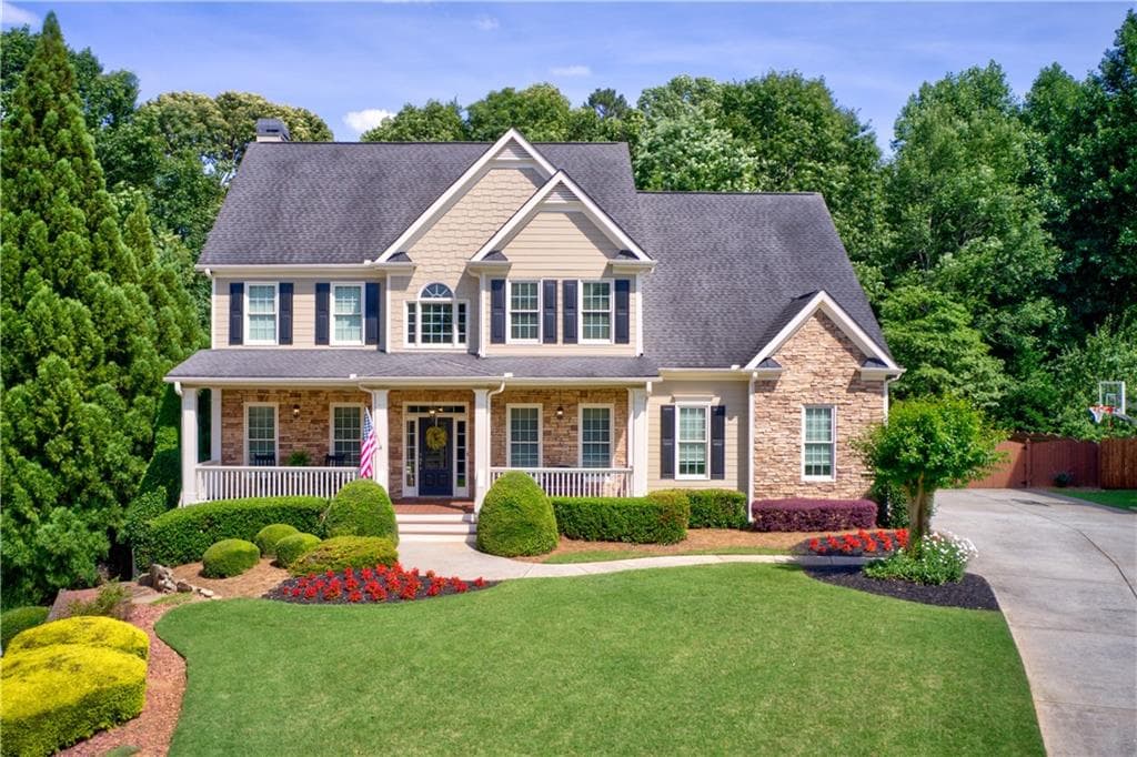 4 bedroom, 5 bathroom, 4,120 sq ft single family residence sold at 4950 Magnolia Creek Drive, Cumming, GA 30028