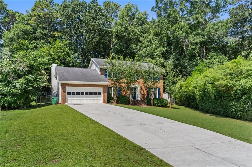 4 bedroom, 3 bathroom, 2,776 sq ft single family residence sold at 4658 Robie Road, Lilburn, GA 30047